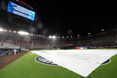 MLB Speedway Classic Braves-Reds matchup suspended due to drenching rain