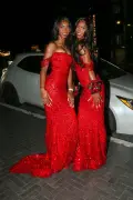 Sean ‘Diddy’ Combs’ twin daughters, Jessie and D’Lila, channel mom Kim Porter in glitzy red prom dresses